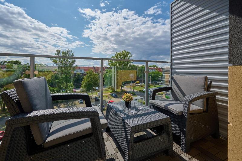 Spacious Apartment suitable for Remote Work with Balcony & Parking by Noclegi Renters - image 13