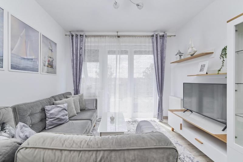 Spacious Apartment suitable for Remote Work with Balcony & Parking by Noclegi Renters - image 29