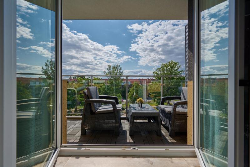 Spacious Apartment suitable for Remote Work with Balcony & Parking by Noclegi Renters - image 17