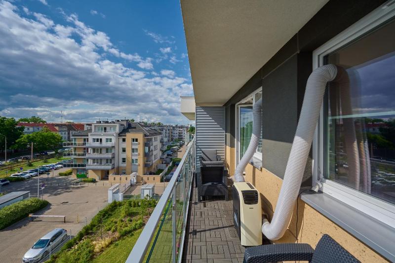 Spacious Apartment suitable for Remote Work with Balcony & Parking by Noclegi Renters - image 14