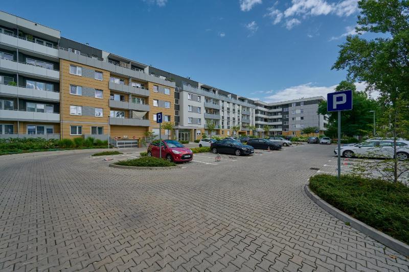 Spacious Apartment suitable for Remote Work with Balcony & Parking by Noclegi Renters - image 30