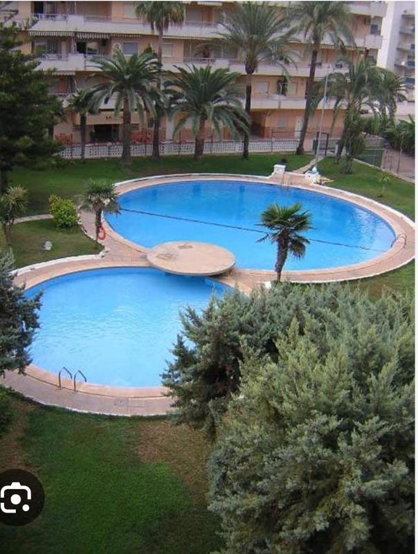 Acogedor apartamento en Daimús junto a la playa con parking privado y piscinas comunitarias Images