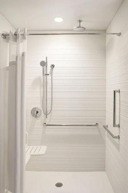 King Room with Sofa Bed and Roll-in Shower - Mobility Accessible image 1