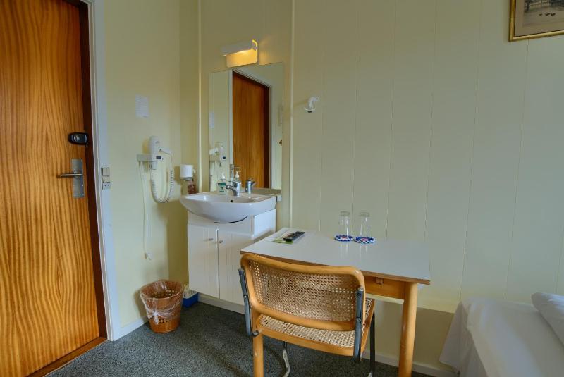Double Twin Room with private toilet and bath opposite room image 2