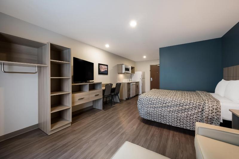 QUEEN SUITE WITH SOFA/DISHWASHER (DISHES/COOKWARE INCLUDED) image 1