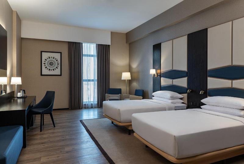 Deluxe Twin, (Comp. Shuttle to DMCC Metro, Marina Mall & JBR, 20% off on F&B outlet) image 1