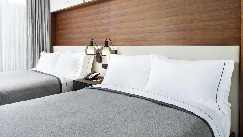 Queen Room with Two Queen Beds - Mobility/Hearing Accessible with Roll-In Shower image 1