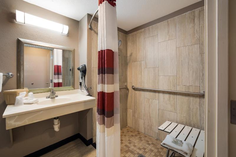 Standard Room with Two Double Beds Disability Access Roll-In Shower Smoke Free image 1