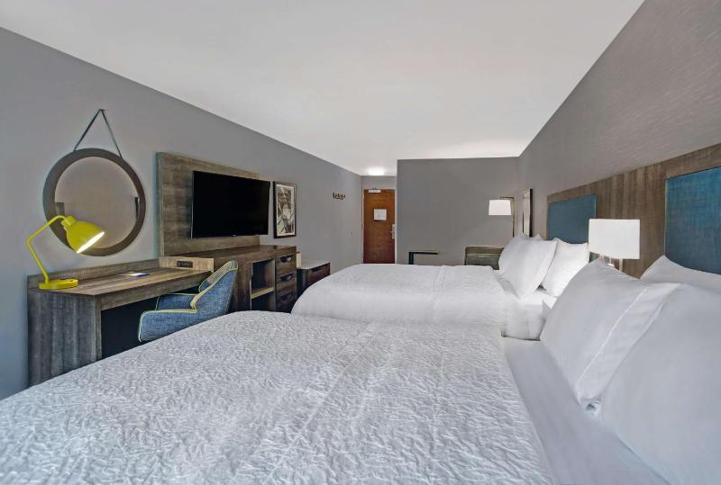 Queen Room with Two Queen Beds and Sofa Bed image 1