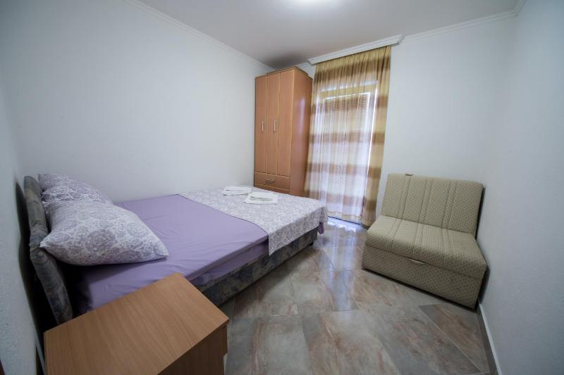 Two-Bedroom Apartment with Balcony and Garden View image 1
