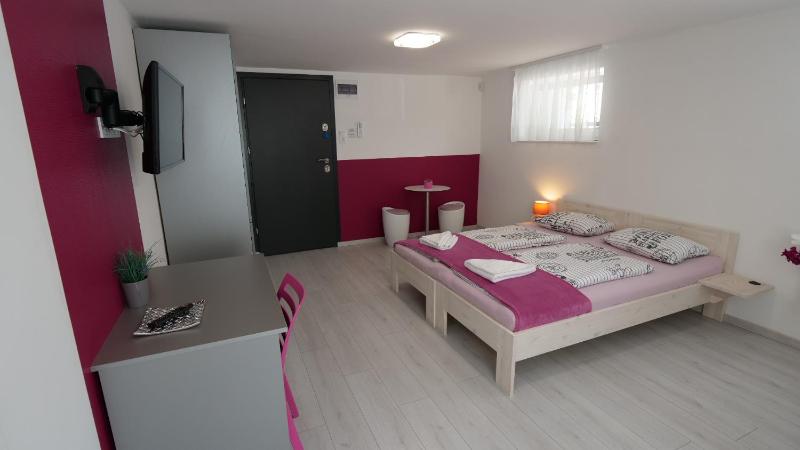 Quadruple Room with Private Bathroom image 1