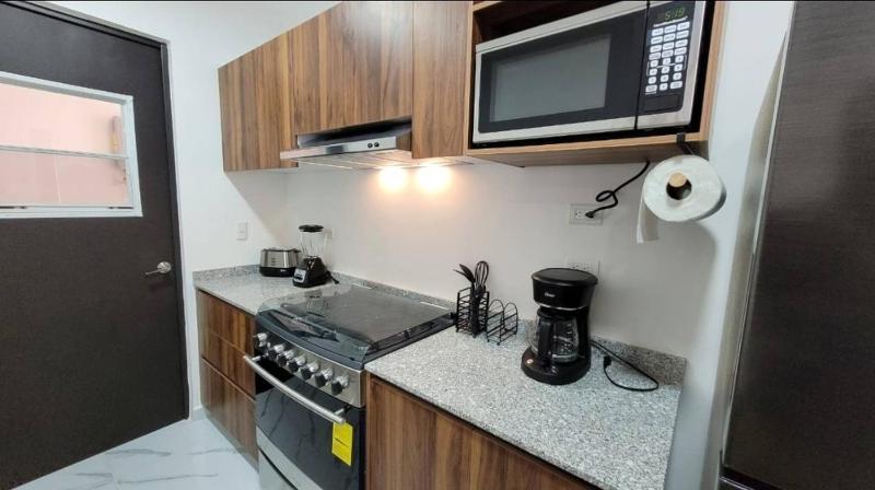 Moderno Departamento Vacacional En Playa - image 35