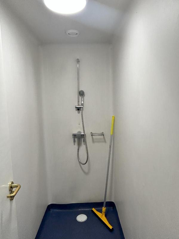 Bunk Bed in Female Dormitory Room with Shared Bathroom image 1