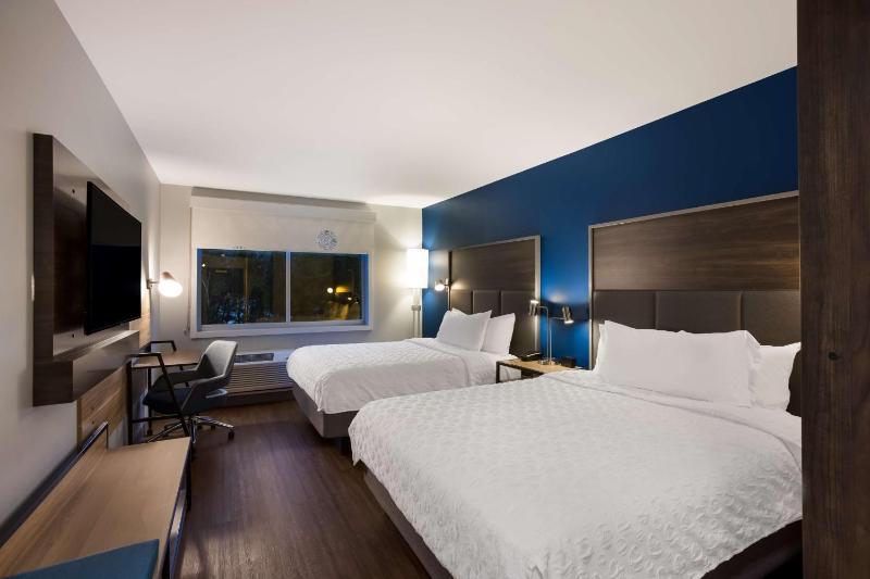 Queen Room with Two Queen Beds and Walk-In Shower image 1