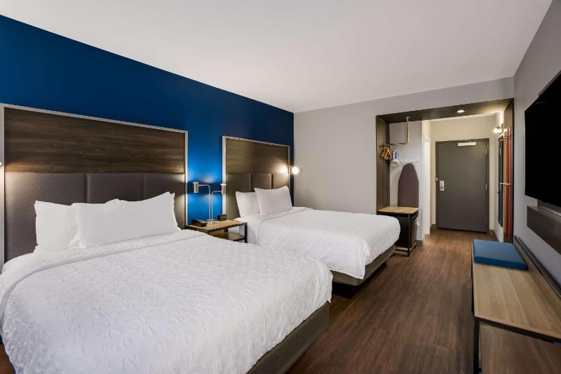 Queen Room with Two Queen Beds and Walk-In Shower image 4
