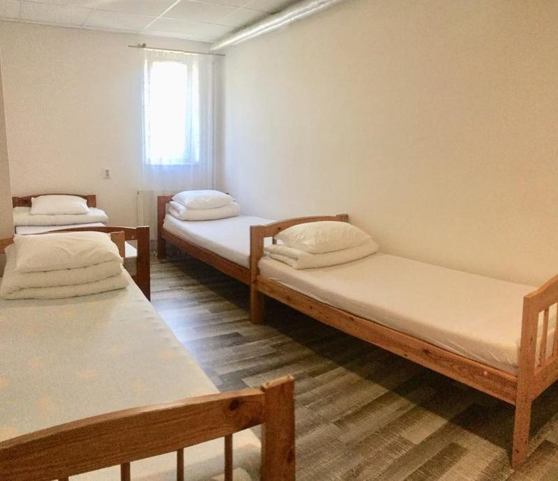 Single Bed in Dormitory Room image 1
