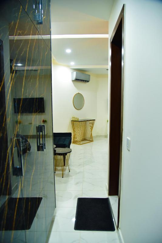 Chic Noir 1 Bedroom Apartment Gulberg - image 14
