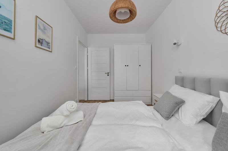 Blue Sky Apartment with Parking & Balcony by Noclegi Renters - image 20