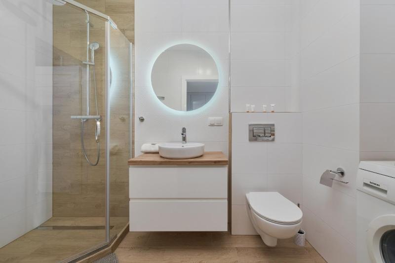 Blue Sky Apartment with Parking & Balcony by Noclegi Renters - image 18