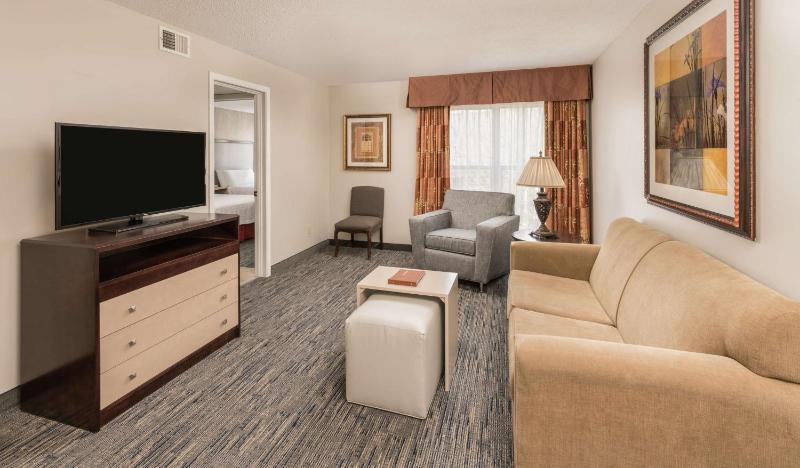 One-Bedroom Suite with Two Double Beds and Sofa Bed image 1