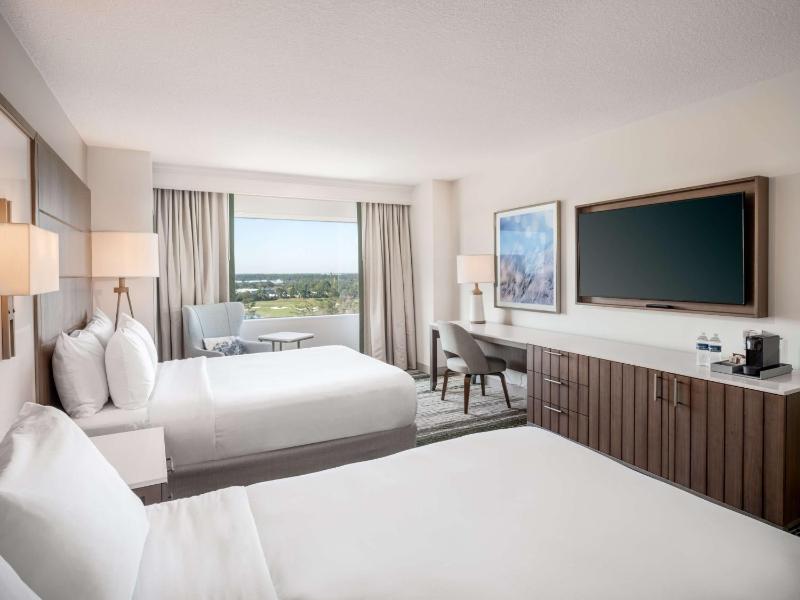 Queen Room with Two Queen Beds and Bath Tub - Mobility Accessible image 1