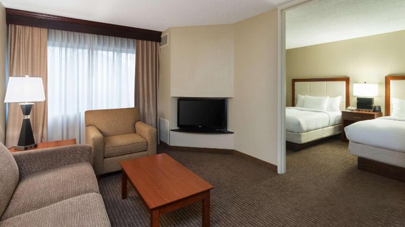 Standard Suite with Two Double Beds and Sofa Bed image 1