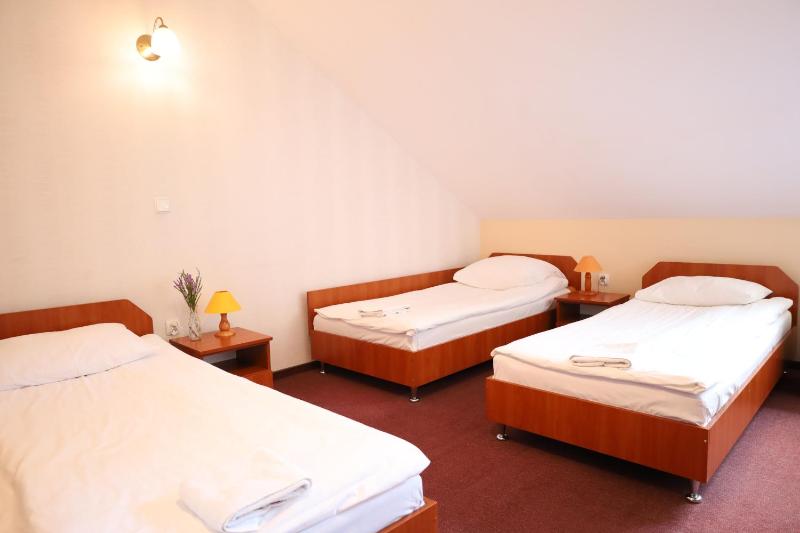 Economy Quadruple Room with Shared Bathroom image 1