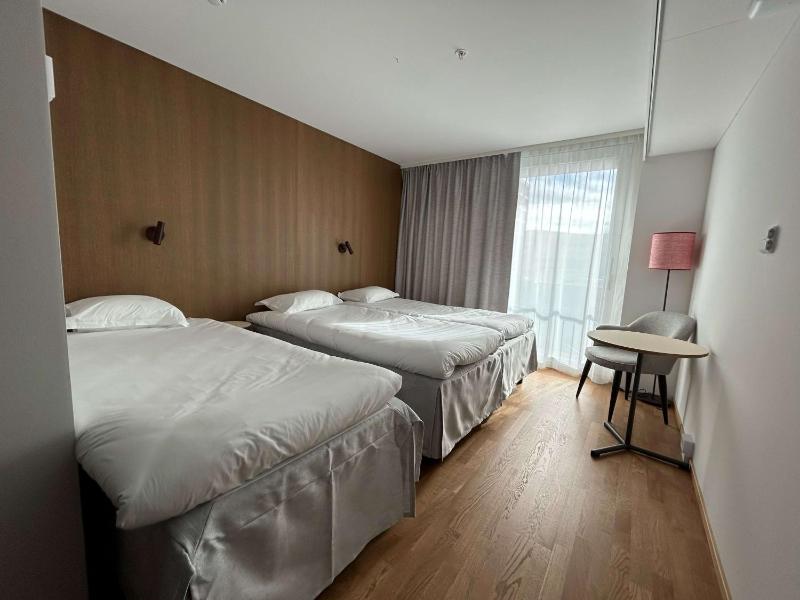 Family Room with Three Single Beds and Balcony - Non-Smoking image 4
