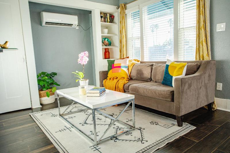 Visit the Beaches and Downtown from this Eclectic Apartment Images