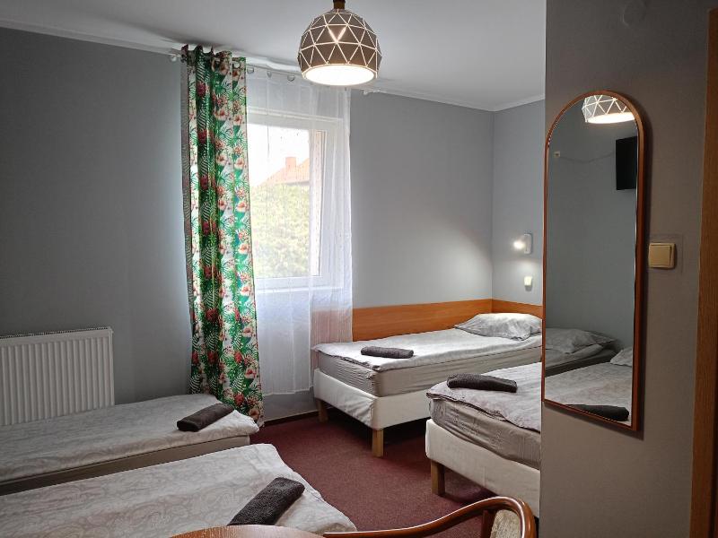 Quadruple Room with Private Bathroom image 2