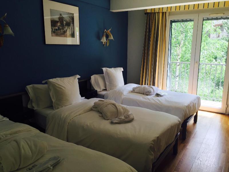 Triple Room (2 Adults + 1 Child) image 2