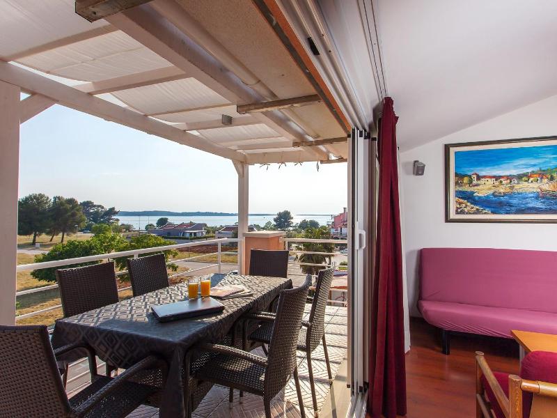 Two-Bedroom Apartment with Balcony and Sea View image 1