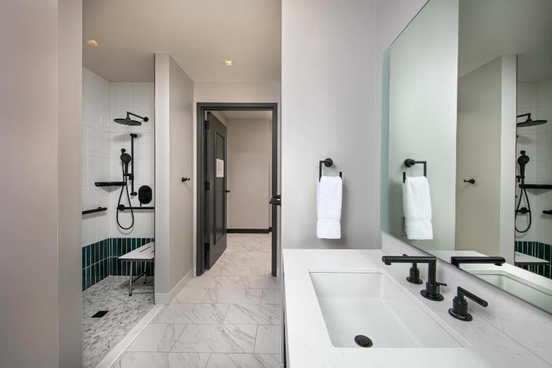 Mobility Roll-In Shower - Capitol Hill Suite - King and Sofa bed with Capital City View image 2