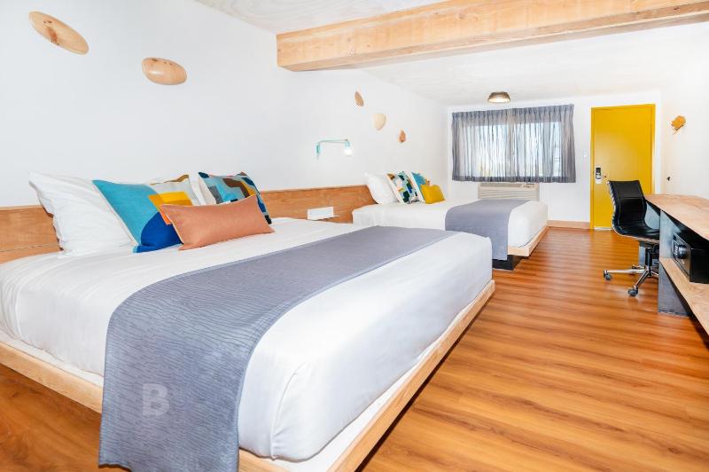Deluxe Queen Room with Two Queen Beds image 1