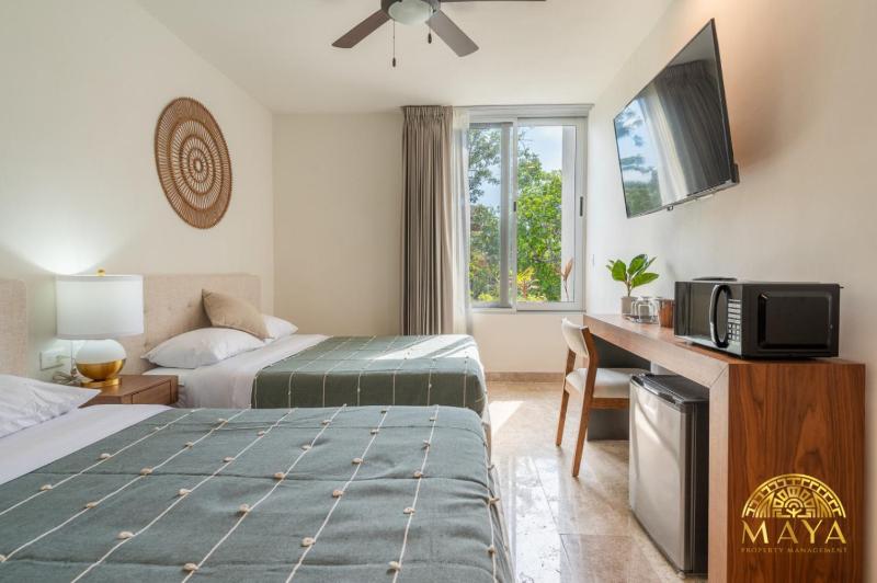 NHOA 309C Lux 1BR Condo Pool View in Aldea Zama - image 16