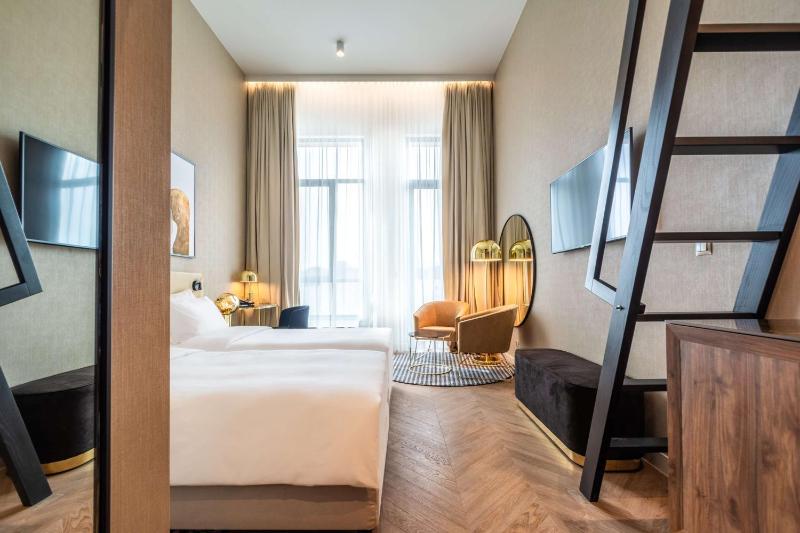 Family Room with Mezzanine and Balcony image 3