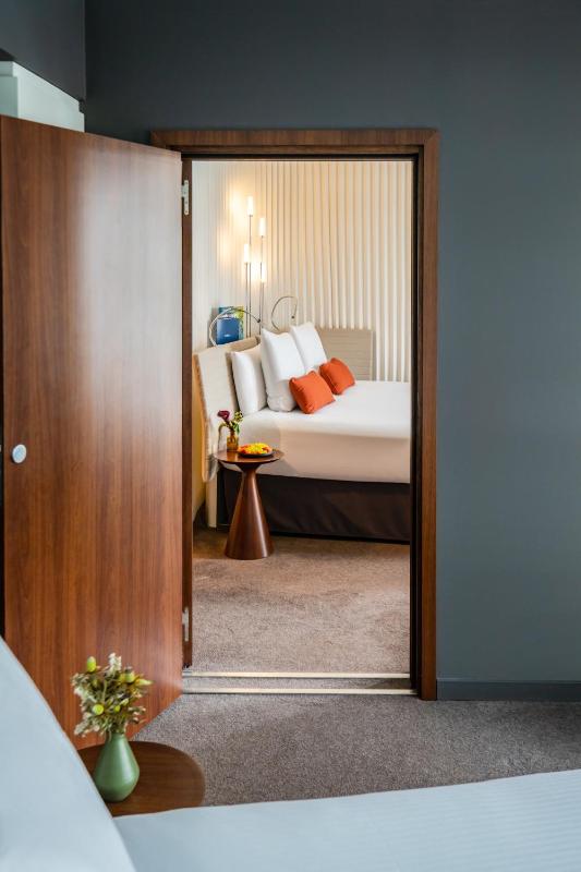 Classic Family Room with Two Connecting Rooms and Pool View image 3