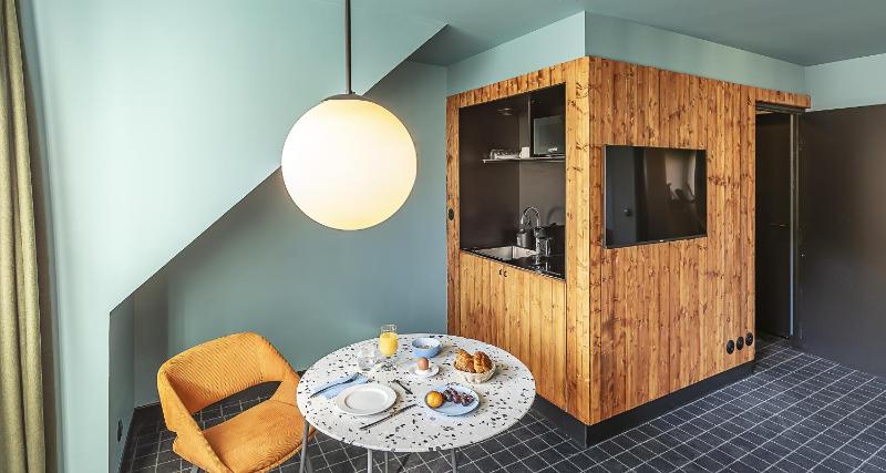 Privilege Queen Room with Sofa Bed and Kitchenette image 2