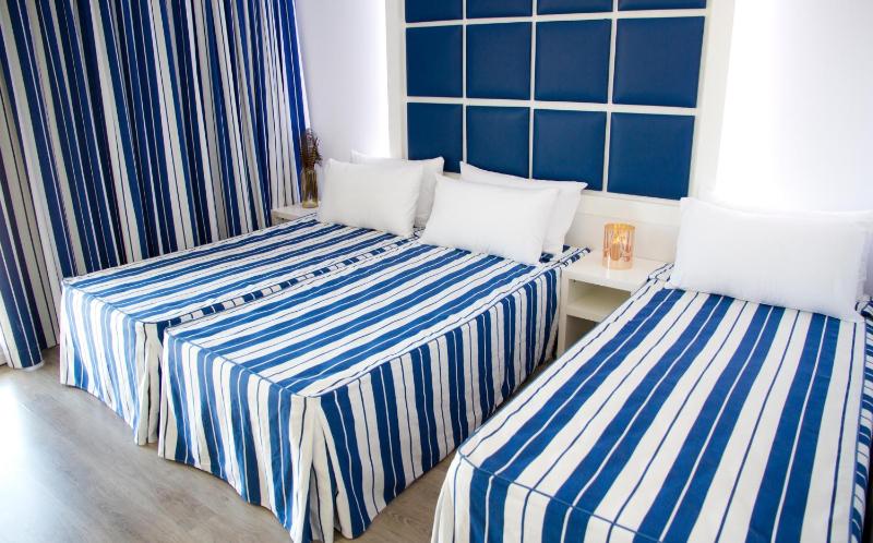 Triple Room (2 Adults + 1 Child) image 2