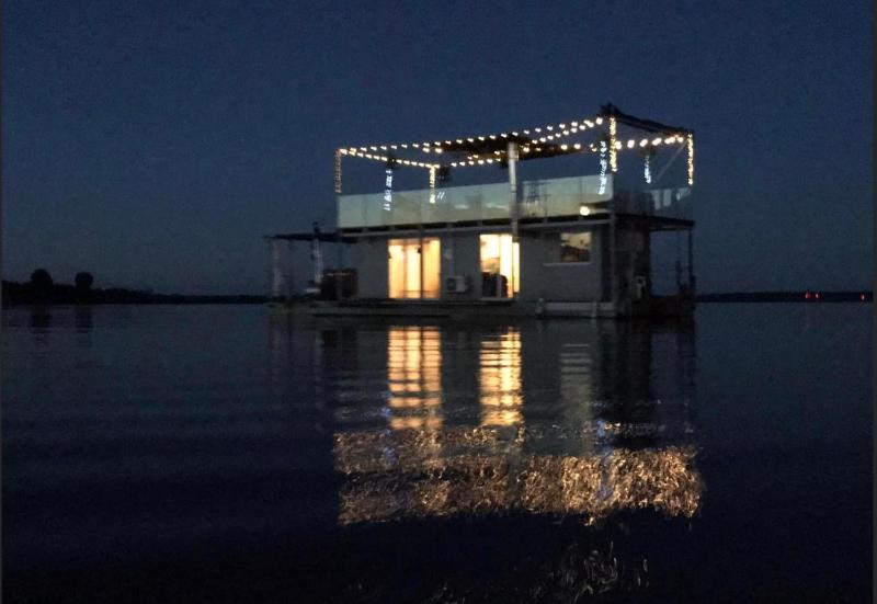 Houseboat on the water - image 47