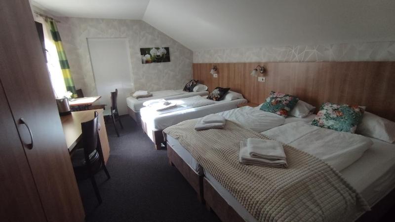 Quadruple Room with Private Bathroom image 1