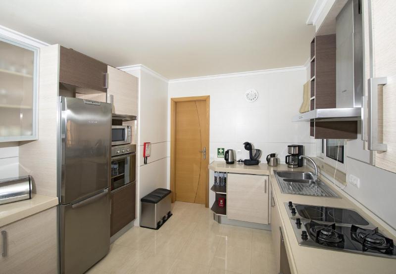 LGS65T2 Luxuoso T2 frente praia em condominio - image 23