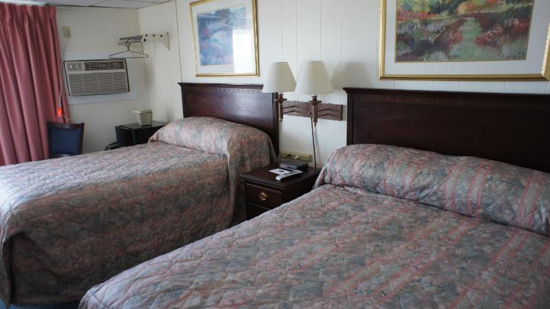 Queen Room with Two Queen Beds with Side Ocean View and Private Balcony image 1