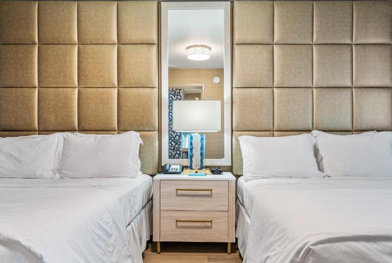 Queen Suite with 2 Queen Beds and Pool View