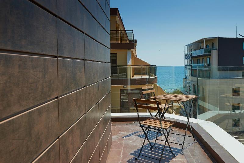 One-Bedroom Apartment with Balcony and Partial Sea View (2 Adults + 2 Children) image 1