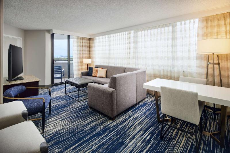 Two-Room Corner King Suite with One King Bed and Sleeper Sofa - Balcony image 3