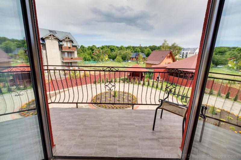 Family Room with Balcony image 1