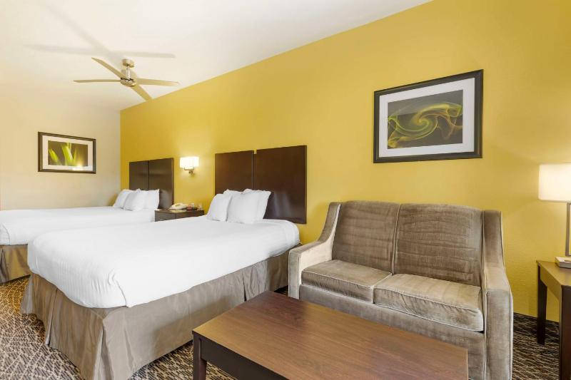 Queen Room with Two Queen Beds and Sofa Bed image 1