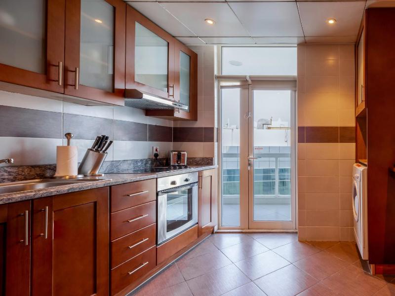 One-Bedroom Apartment Creek Side with Kitchen image 4