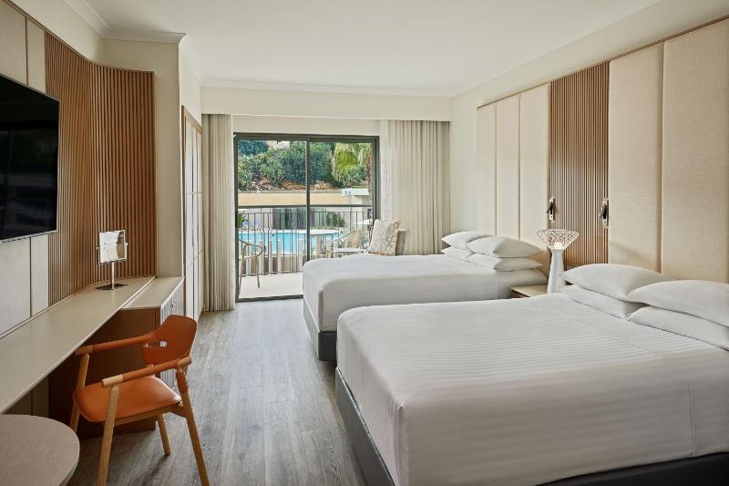 Deluxe Pool View Room, 2 Queen Beds with Balcony image 3